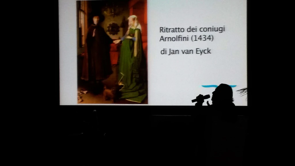 il regista Pupi Avati mentre spiega racconta il ritratto dei coniugi Arnolfini , suo quadro favorito - Ph David Colantoni
